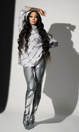 Monica wearing Balenciaga pants