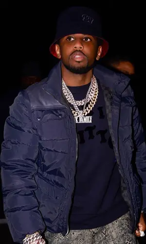 Fabolous wearing Louis Vuitton sweater