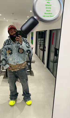 ASAP Bari wearing Chanel cap