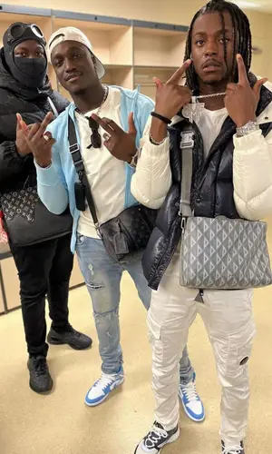 Koba Lad wearing Dior sneakers