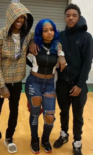 King Von wearing Burberry sneakers