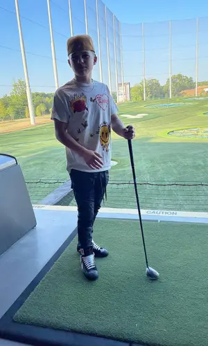 Javon Walton wearing PacSun t-shirt