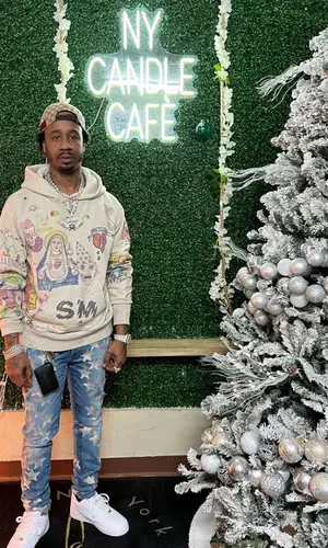 Benny The Butcher wearing Amiri jeans