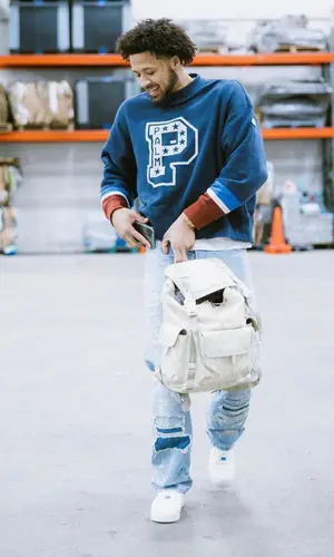Cade Cunningham wearing Heron Preston jeans