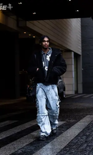 Joshua Christopher wearing Alexander McQueen boots