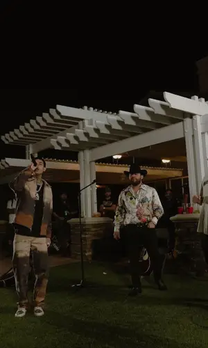 Natanael Cano wearing Nahmias pants