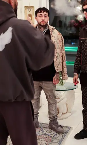 Natanael Cano wearing Gucci pants
