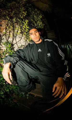 Achraf Hakimi’s Outfit in Balenciaga Jacket & Adidas (2022)