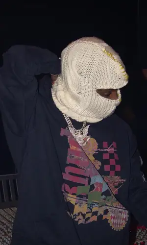 Lil Double 0 wearing Rhude hat