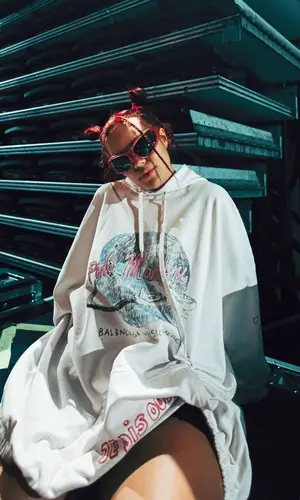 Karol G wearing Balenciaga hoody