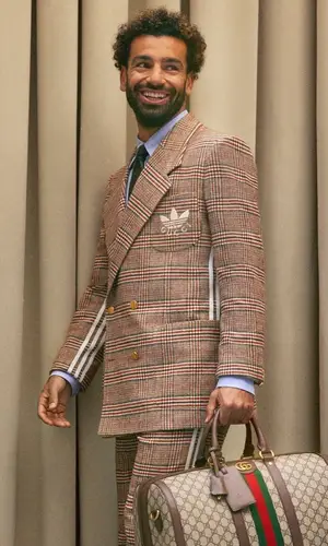 Mohamed Salah wearing Gucci trousers