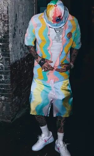 Millyz wearing Casablanca shirt
