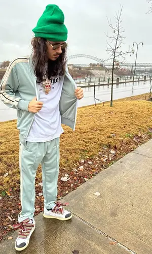 BabyTron wearing Palm Angels pants