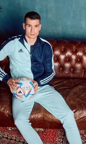 Dominik Livakovic wearing Adidas pants