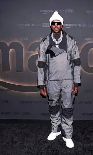 2 Chainz wearing Prada hat
