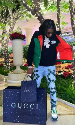 CJ So Cool wearing Gucci hoody