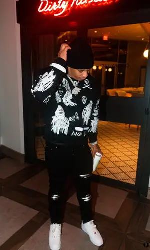 Doodie Lo’s Outfit in Amiri Sweatshirt & Nike Sneakers (2022)