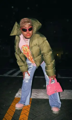 Saucy Santana wearing Balenciaga cap