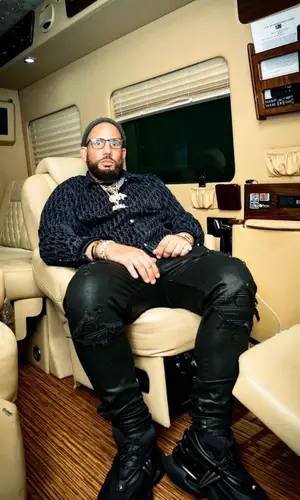 DJ Drama wearing Amiri jeans
