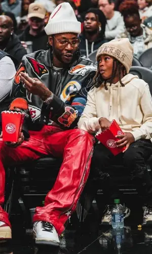 2 Chainz wearing Prada hat