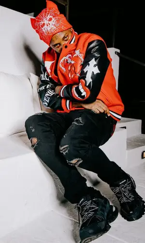 Famous Dex wearing Juvenile jacket
