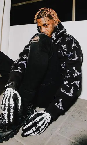 Famous Dex wearing Juvenile glov