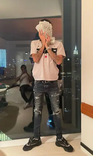 Ot7Quanny wearing Dior sneakers