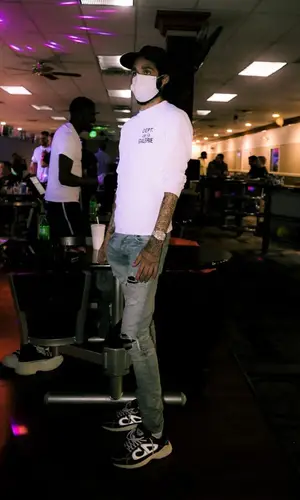 Ot7Quanny wearing Gallery Dept. sweater