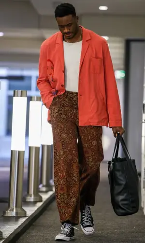 Thanasis Antetokounmpo’s Outfit in KidSuper Jacket, Suss Top & Converse Sneakers (2022)