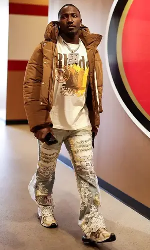Deebo Samuel’s Outfit in Rhude Jacket, Who Decides War Jeans & Balenciaga Sneakers (2022)