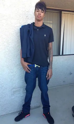 Blueface wearing Polo Ralph Lauren shirt