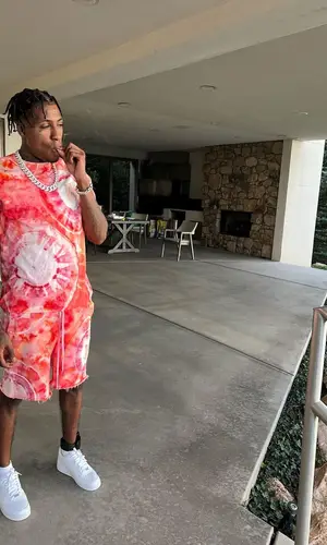 NBA YoungBoy wearing Amiri shorts