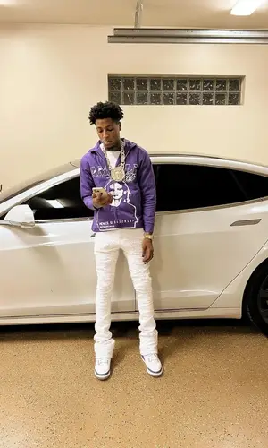NBA YoungBoy wearing Amilli Atelier jacket