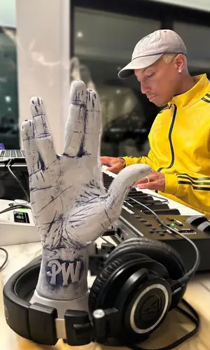 Pharrell Williams wearing Adidas jacket