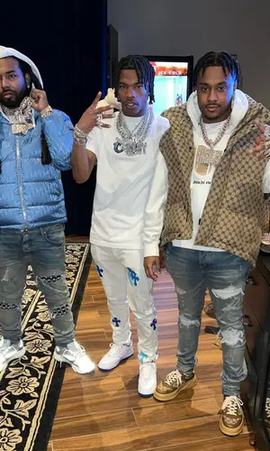 Tay B wearing Palm Angels hoody