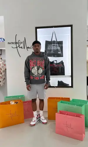 Roddy Ricch’s Outfit in Denim Tears Hoodie, Jordan Sneakers & Polo Ralph Lauren Socks (2022)