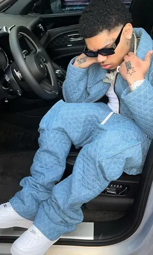 No Cap wearing The Vision Clothing Co. pants