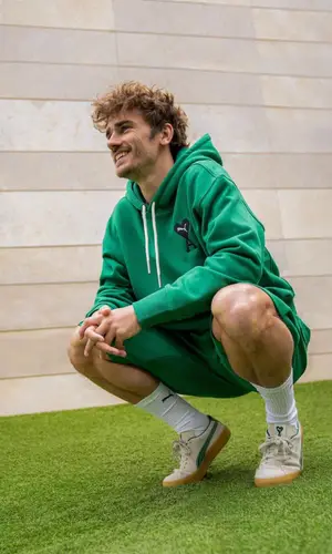 Antoine Griezmann wearing Puma shorts