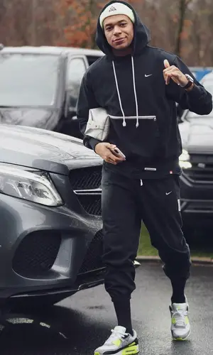 Kylian Mbappe wearing Nike pants