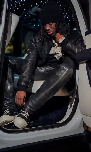 Kai Cenat wearing Chrome Hearts pants