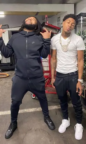NBA YoungBoy wearing Nike pants