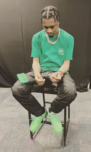 Lil Tjay wearing Bottega Veneta other