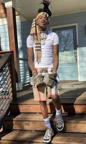 JayDaYoungan wearing Burberry scarf