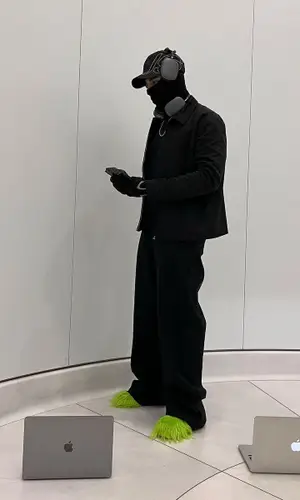 fourfive wearing Grimywrld sneakers