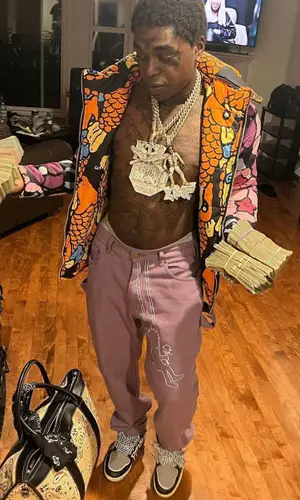 Kodak Black wearing Amiri bag