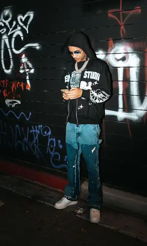 Curly Savv wearing Stellar Studio t-shirt
