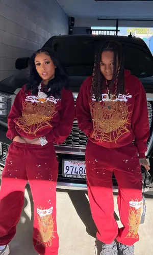 Coi Leray’s Outfit in Spider Worldwide Hoodie, Nike Sneakers & Travis Scott Merch (2022)