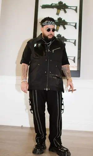 Belly wearing Prada boots
