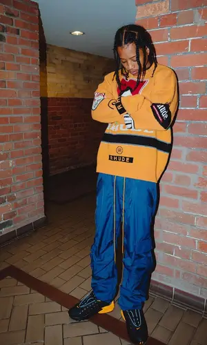Pressa wearing Nike sneakers