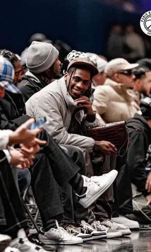 Travis Scott wearing Hermes bag